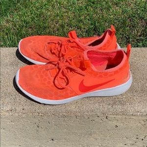 Size 7 every day coral Nike walking sneakers.